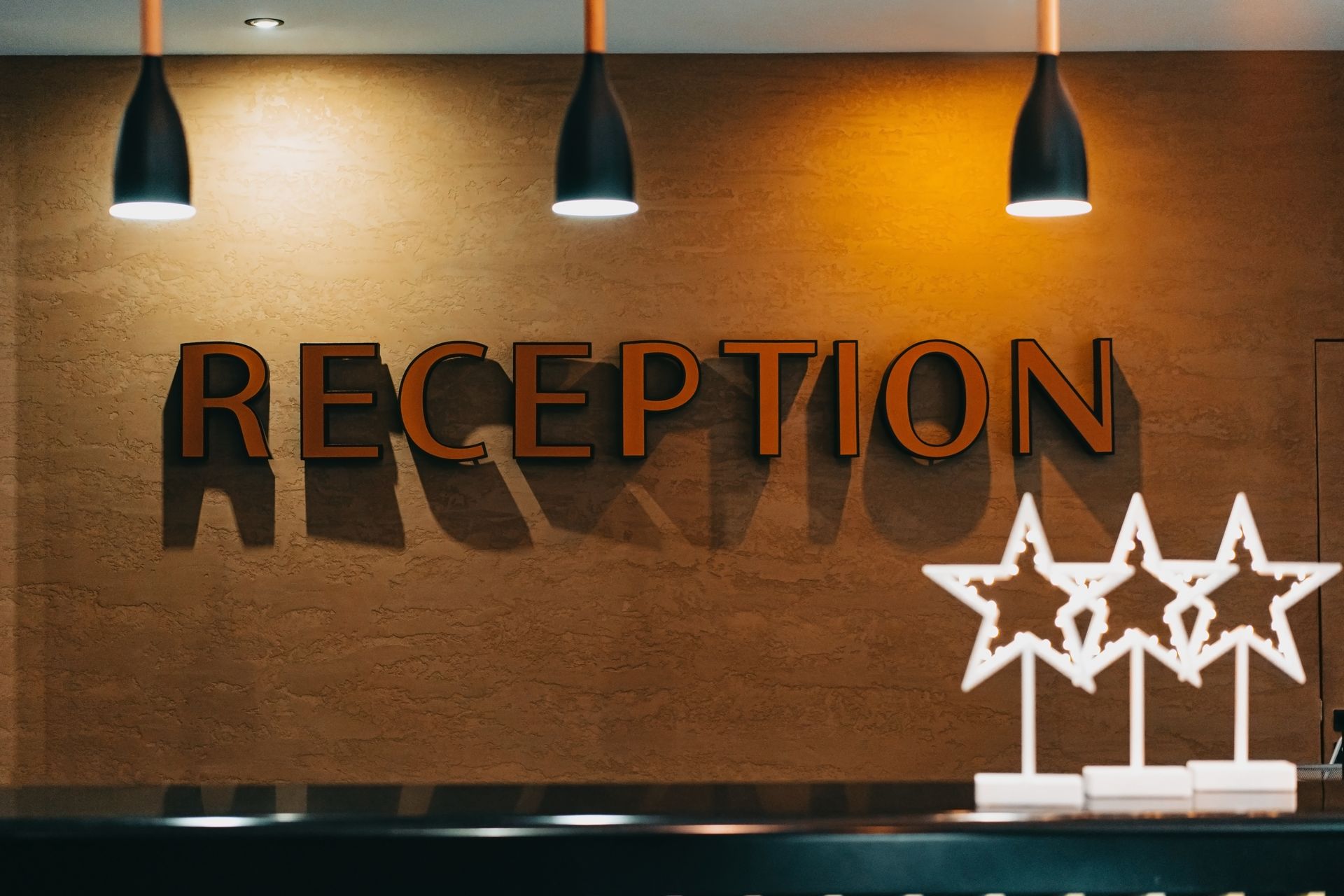 Hotel management software front desk reservation calendar and guest booking interface