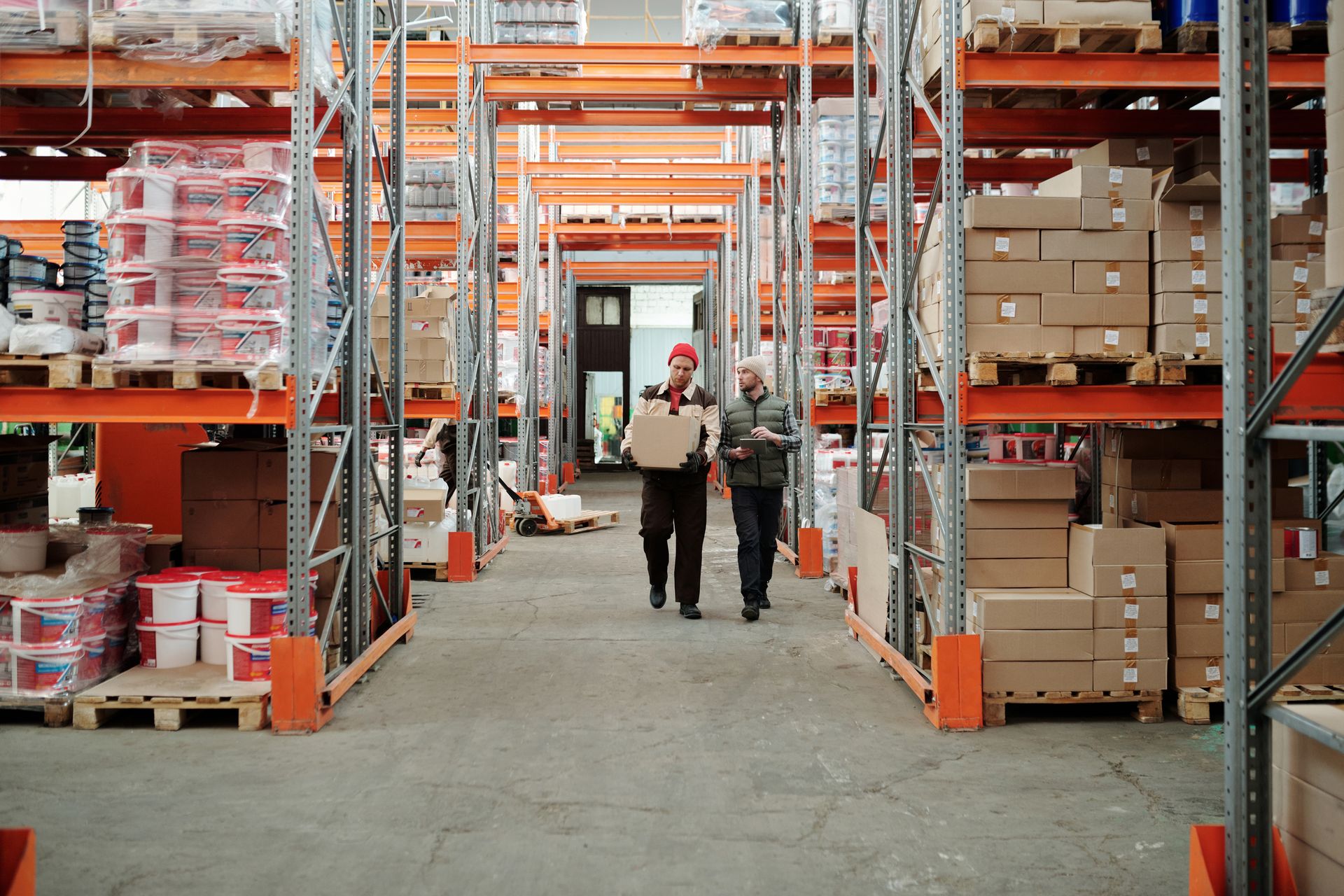 Inventory management software dashboard showing multi-warehouse stock levels and reorder alerts